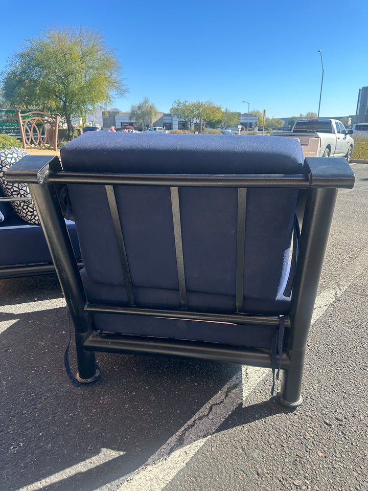 Heavy wrought iron patio chairs with sunbrella cushions